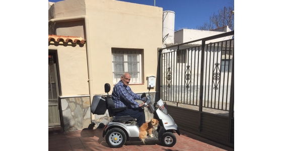 Breeze S4 Mobility Scooter and a happy customer in Spain